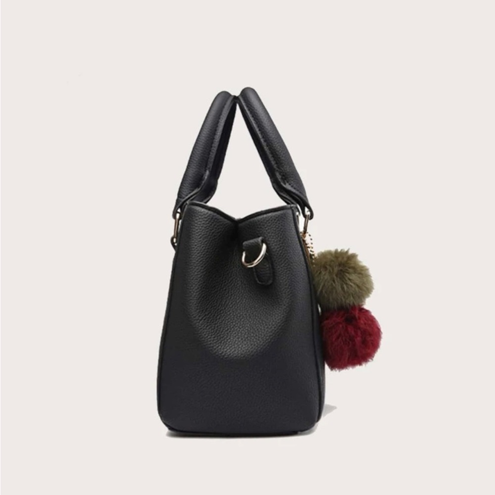 Black purse with Pom Poms